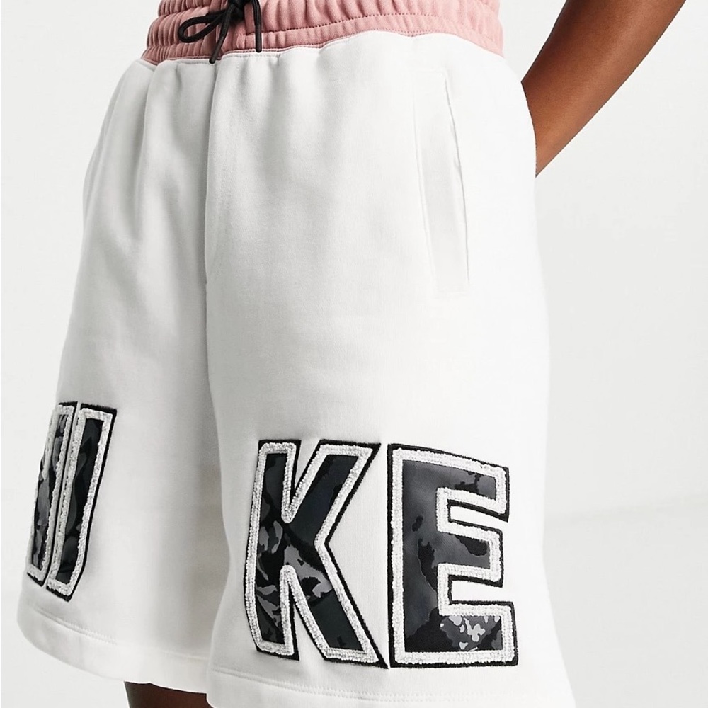 Nike White Shorts with Pink Waistband and Black Logo Panels